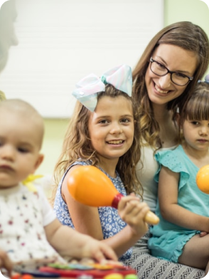 Two children playing, one in green shirt