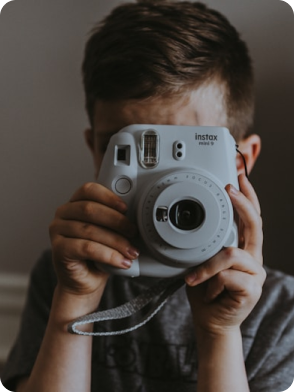 Two children playing, one in green shirt