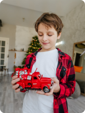 Two children playing, one in green shirt