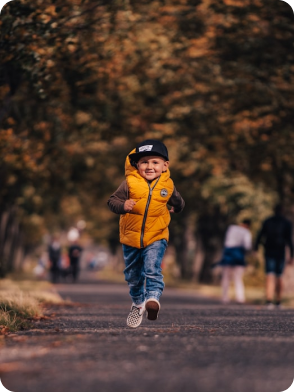 Two children playing, one in green shirt