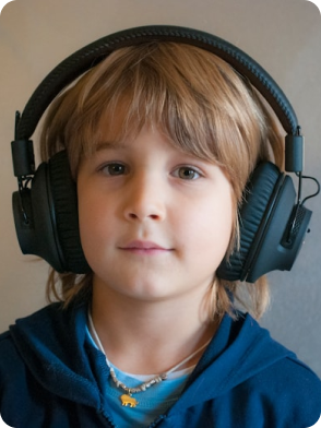 Two children playing, one in green shirt