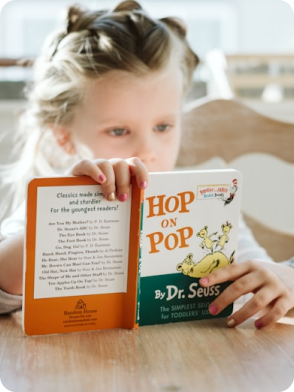 Two children playing, one in green shirt