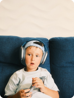 Two children playing, one in green shirt